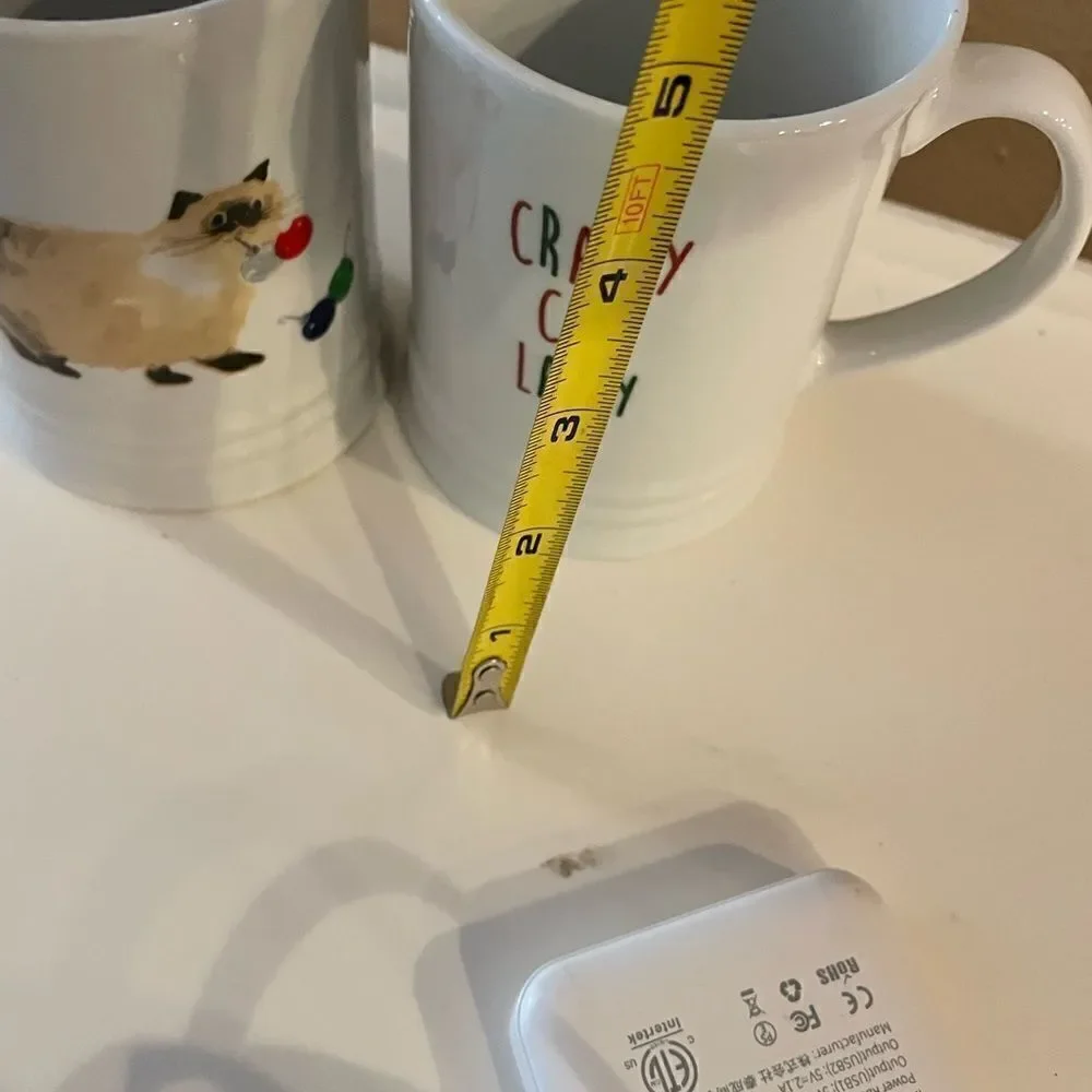 Fringe Cat Christmas themed coffee cups